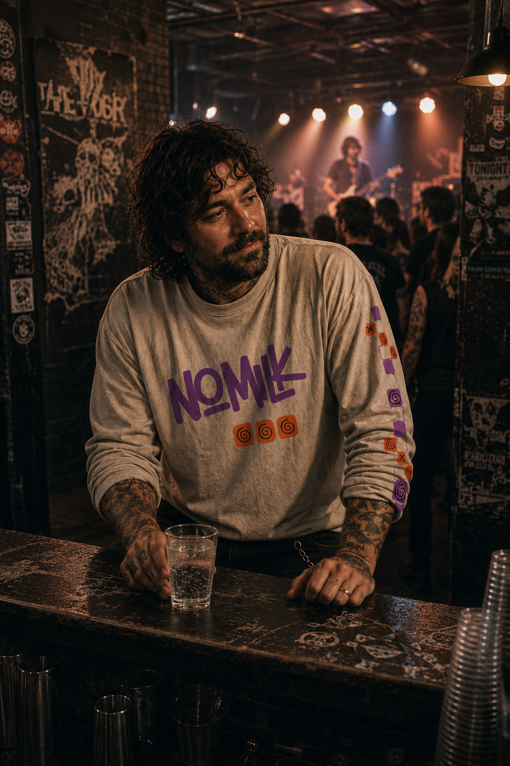 Person at bar with Faded Bone long sleeve Noughts Win