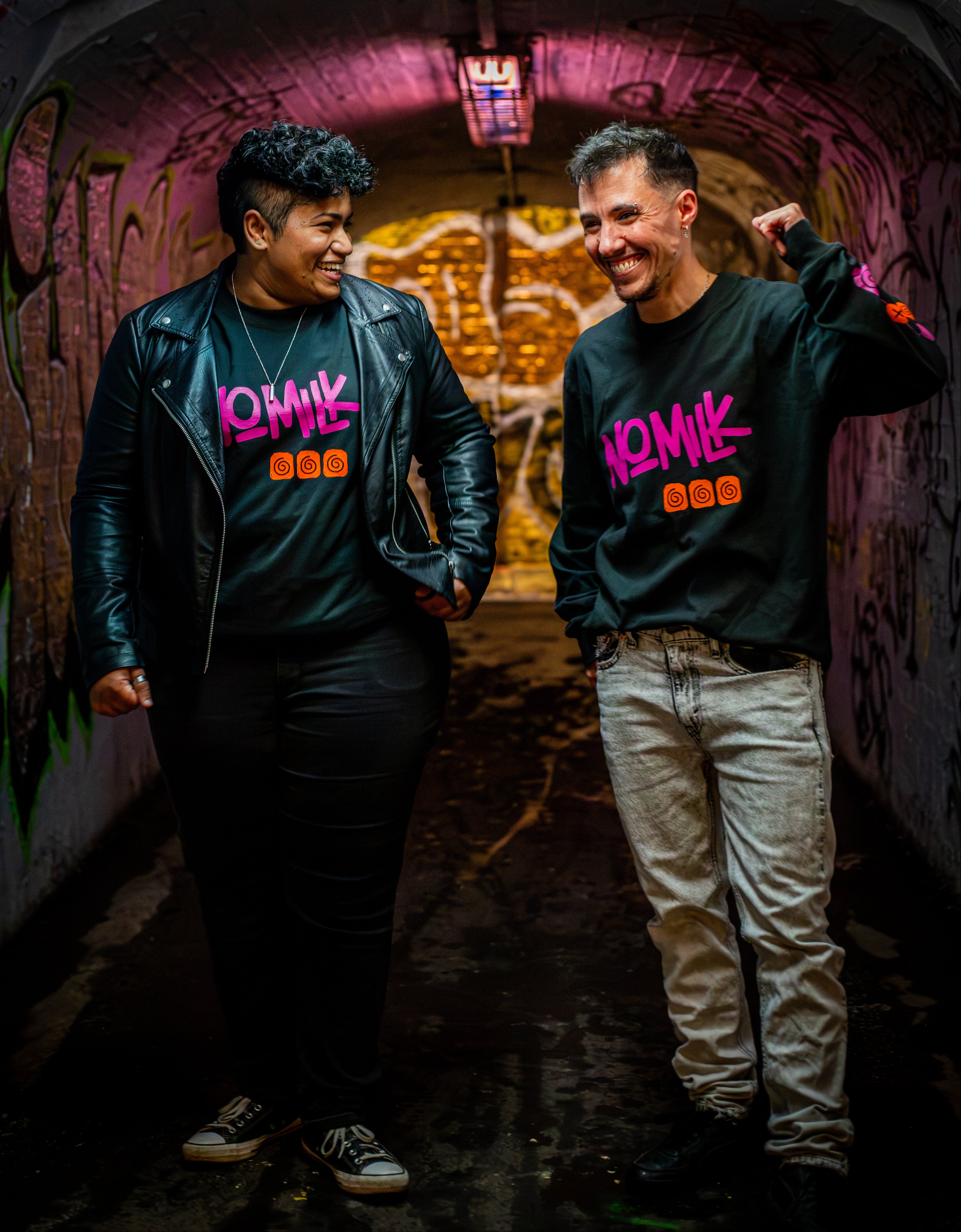 2 friends in Noughts Win long sleeve in a tunnel